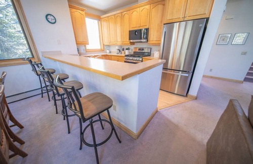 Mountain House House | Walk to ski slopes! Private hot tub and garage!