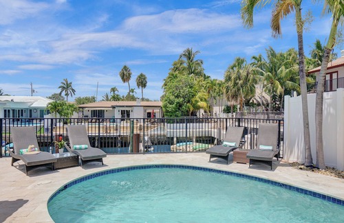 Bel Air House | Walk to the beach! Tiki Hut, Waterfront, Heated Pool, kayaks, bicycles, arcade!