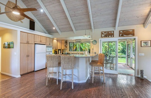 Princeville House | Walk to the beach in this lush, serene house with a private garden oasis