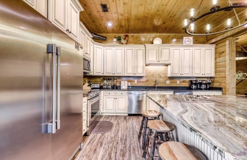 Gatlinburg Cabin | Walk to Town Gatlinburg-Sleeps 60! Hot Tub, Pool Access, Game & Theater Room