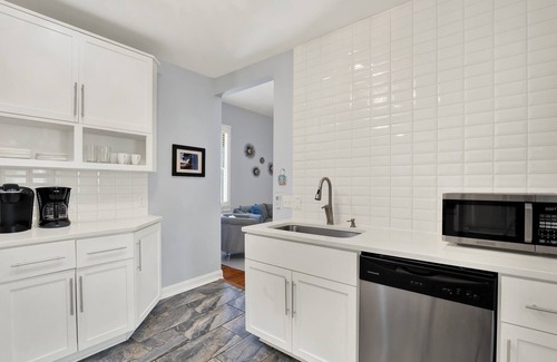 Metropolitan House | Walkable Home in Thomas Square, Heated Pool Access