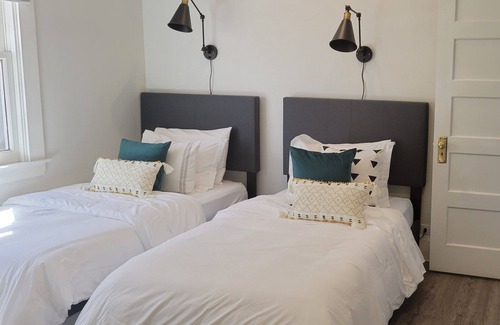 Roosevelt House | Walkable Large Bungalow in Historic Neighborhood with HEATED Pool included