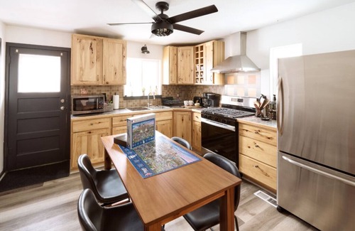 Sheridan House | Warm and inviting 2BR retreat in central Sheridan. Unwind in a King Thuma bed after a day of winter adventure. Just 5 minutes to downtown dining & shops. The perfect cozy base camp.