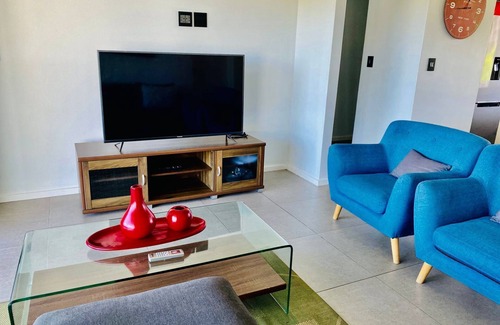 Hillhead Apartment | Warmth & comfortability, all in the heart of an apartment at Pebble Beach.