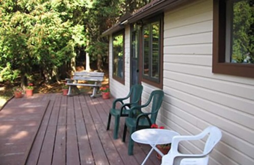 Baileys Harbor Cottage | Watch the amazing Door County sunsets from Hickory's porch!