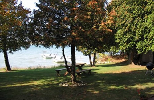 Baileys Harbor Cottage | Watch the amazing Door County sunsets from Hickory's porch!
