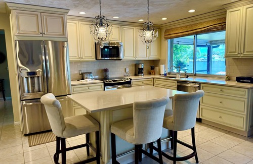 Caloosahatchee House | Watch the Boats go by on your Spectacular Wide Open Gulf Access View