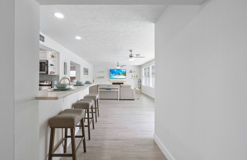 Cocoa Beach House | Water's Edge Retreat with Pool, Hot Tub & Game Room. 3 minutes to the Beach!