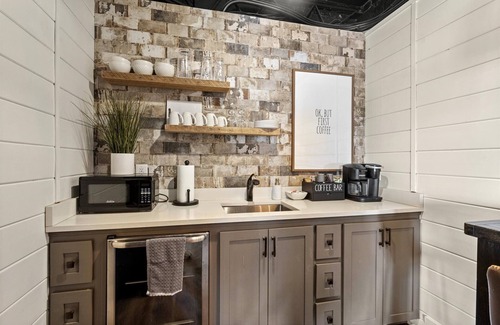 Biloxi Apartment | Water Street Retreat is a cozy dog-friendly studio in downtown Biloxi, steps from beaches, casinos & dining. Features a king bed, sofa bed, kitchenette, modern bath, Wi-Fi & easy parking—perfect for exploring the coast.