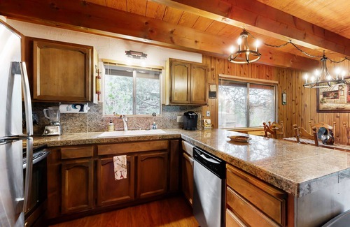 Groveland Cabin | Water-view cabin near 3 beaches & marina with pool, fireplace, decks, & grill