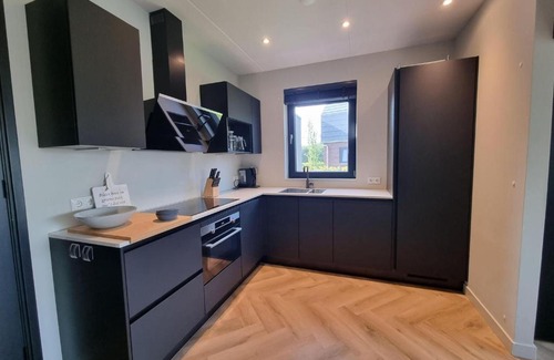 Balk House | Water Villa in Balk with Private Jetty