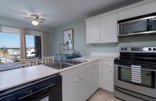Bohicket Marina Village House | Waterfront 1BR 2BA Condo with Incredible Sunsets and Marina Views. Pet Friendly