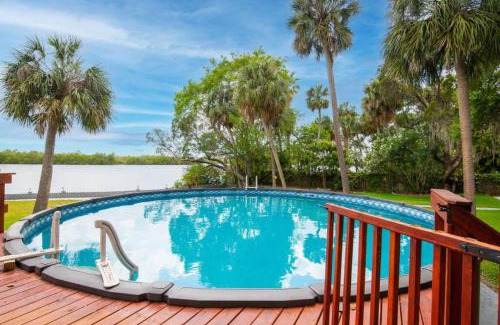 Riverview House | Waterfront 6BR Oasis with Pool, Gym, and Huge Dock