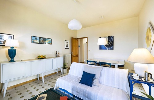 Pozzillo Apartment | Waterfront apartment with garden and wide sea view