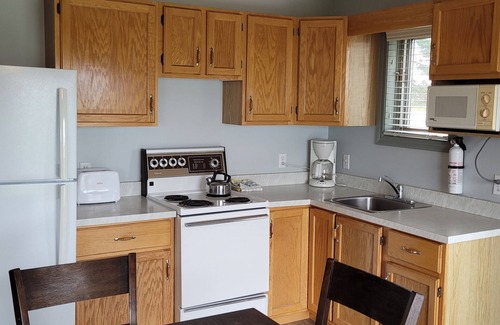 Richibucto House | Waterfront & Beach Retreat with beach-community Pool and Hot Tub