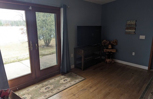 Siren Cabin | Waterfront Cabin in Siren on Clear Lake, Hot Tub, sandy shoreline & more.