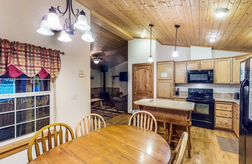 South Fork Cabin | Waterfront cabin with mountain view, wood stove, private hot tub, & WiFi