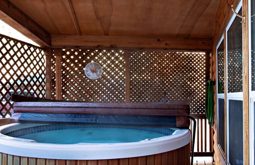 South Fork Cabin | Waterfront cabin with private hot tub, furnished deck, wood stove, & free WiFi