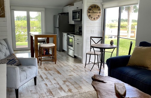 New Smyrna Beach Condo | Waterfront Cottage - Your perfect Retreat to Rest and Relax on the River!