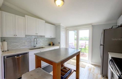 New Smyrna Beach Condo | Waterfront Cottage - Your perfect Retreat to Rest and Relax on the River!