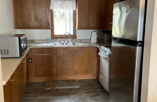 Constantia Cottage | WATERFRONT COTTAGE WITH WARM SUNSETS AND LARGE PORCH ON ONEIDA LAKE