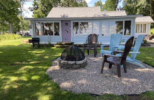 Constantia Cottage | WATERFRONT COTTAGE WITH WARM SUNSETS AND LARGE PORCH ON ONEIDA LAKE