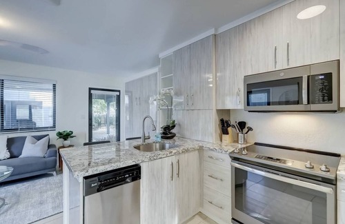 Middle River Terrace Apartment | Waterfront Deck ~ Pool ~ Kayak