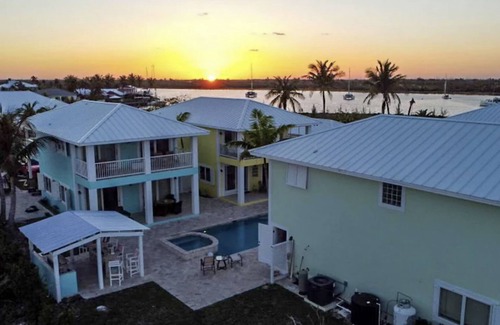 Treasure Cay House | WATERFRONT FAMILY COMPOUND 3 HOMES SLEEPS 30 WITH POOL, 3 BOAT SLIPS