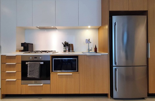 Docklands Apartment | Waterfront fully furnished apartment within free tram zone and free parking bay.