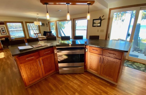 Sturgeon Bay House | Waterfront gem, sandy beach, modern kitchen, large great room, free firewood