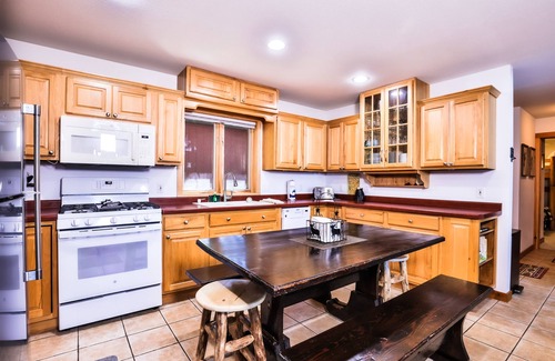 Eagle River Cottage | Waterfront getaway with wood fireplace, dock, & lakeside deck