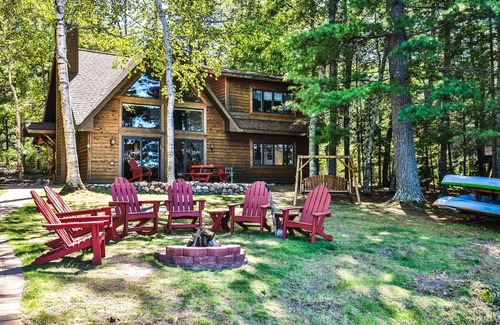 Eagle River Cottage | Waterfront getaway with wood fireplace, dock, & lakeside deck