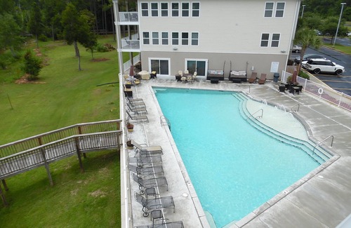 Foley Condo | Waterfront - great fishing, peaceful & quiet, yet close to Tanger Outlets & OWA