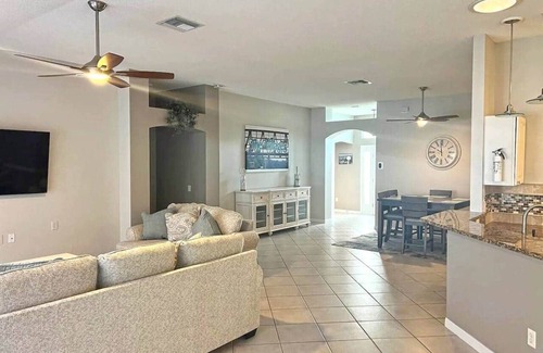 The Villages House | Waterfront, Heated Pool, Golf Cart, & 2 King Beds