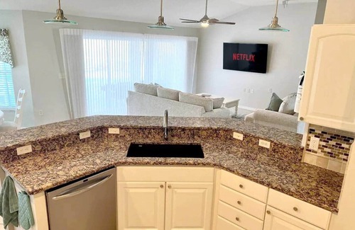 The Villages House | Waterfront, Heated Pool, Golf Cart, & 2 King Beds