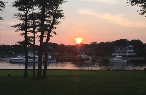 Hampton Bays House | Waterfront home with deep water dock on Penny Pond