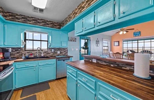 Palacios House | Waterfront Home With Private Fishing Pier on Turtle Bay