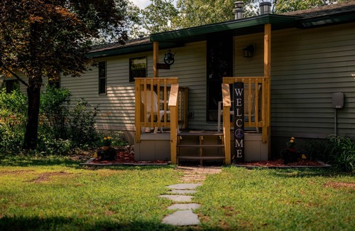 Oxford House | Waterfront lake house with dock, gazebo, kayaks, firepit, & central AC