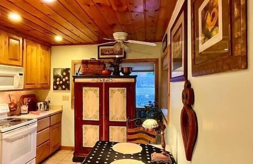 Kohls Ranch Cabin | Waterfront luxurious midcentury Log cabin