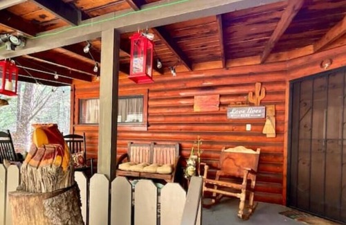 Kohls Ranch Cabin | Waterfront luxurious midcentury Log cabin