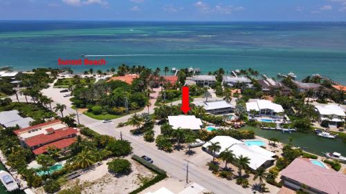 Key Colony Beach House | Waterfront Luxury Home with Pool and Boat Dock home