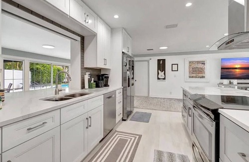 Lighthouse Point Apartment | Waterfront Oasis with Pool, Games, & Hot Tub