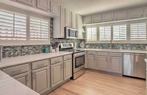 Sunset Reef Cottage | Waterfront Oasis w/ Views, Dock & Hot Tub!