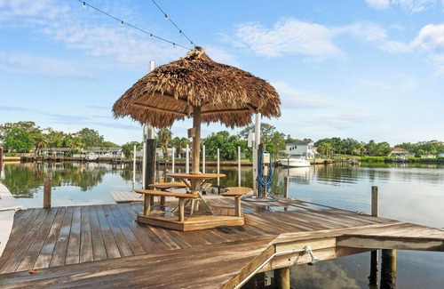 Harbor Hills House | Waterfront Oasis w/Pool, Spa, Boat & Jet ski Dock, Game Room & Outdoor Kitchen
