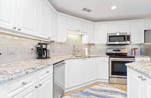 Morehead City Condo | Waterfront OLDE TOWN YACHT CLUB Condo w/Pool & Stunning Views of Radio Island