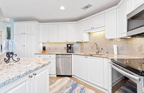 Morehead City Condo | Waterfront OLDE TOWN YACHT CLUB Condo w/Pool & Stunning Views of Radio Island