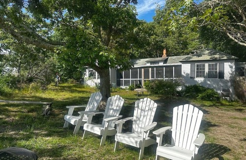Waquoit Village Cottage | Waterfront on Waquoit Bay. 2.5 acre private. Sunsets, swim, kayaks, fish.