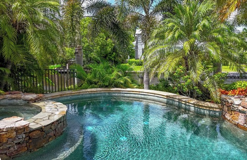 Aqualane Shores House | Waterfront Paradise in Aqualane Shores | 4BR Estate with Pool & Dock