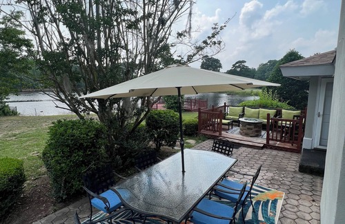 Florence House | Waterfront Paradise with Golf Course Views