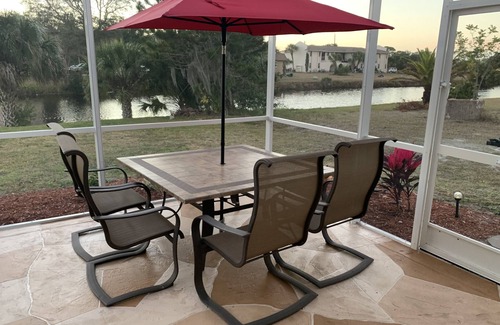 Broadmoor House | Waterfront Pool home very close to golf and beaches